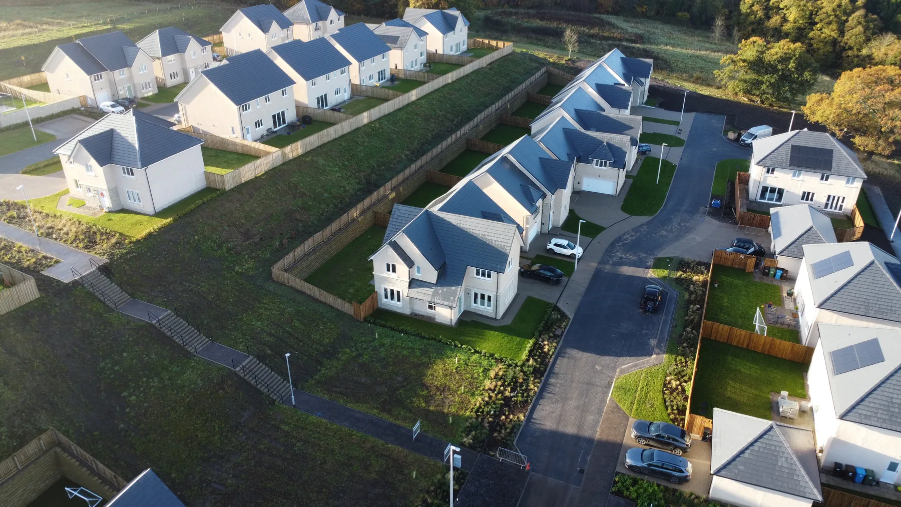Aerial drone photograph of a complete new build housing development in the Lothians