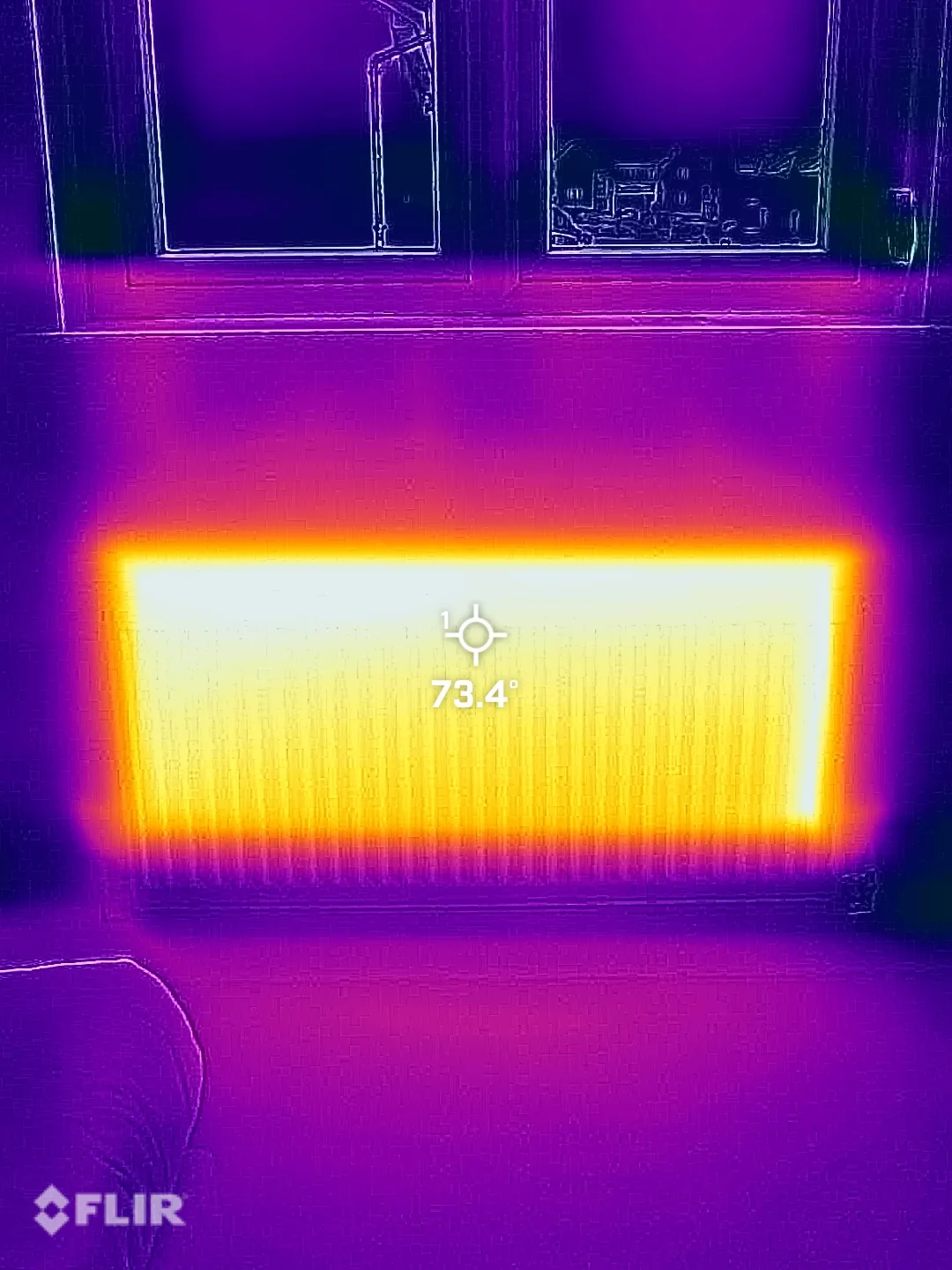 Thermal image confirming even heat distribution across a heating panel
